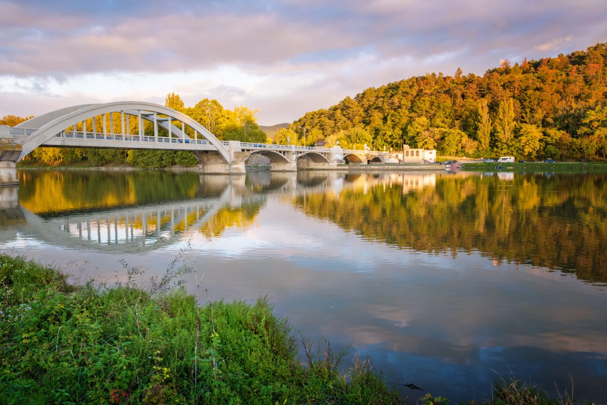 Bridge in Piestany (Slovakia), dark sky + colorful autumn